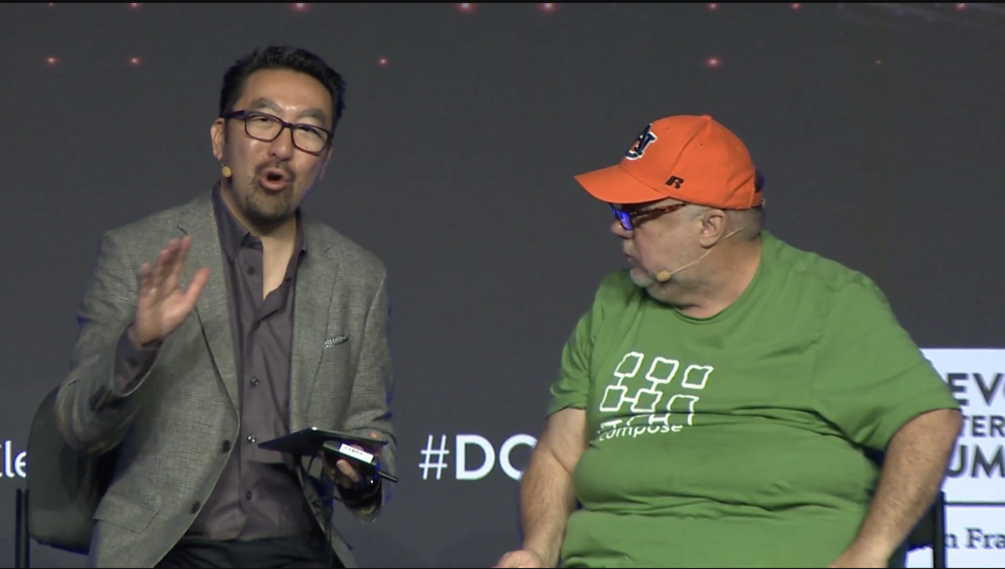 Gene Kim (Left) & John Willis on stage at a conference